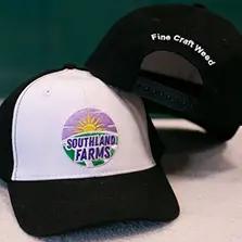 black and white cap from southland farms merch